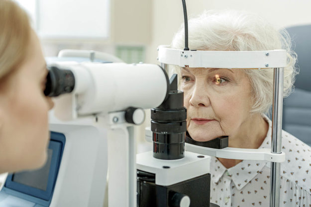 How to Know If You Have Cataracts and What to Do About Them senior woman getting checked for cataracts