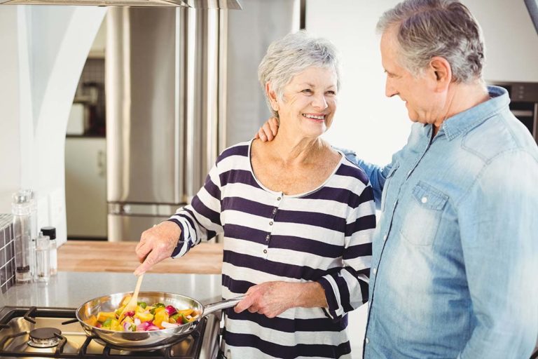 couple cooking organic foods