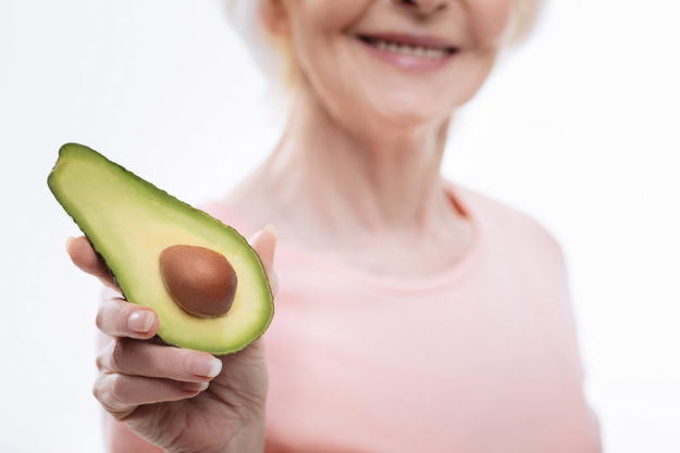 What’s the big deal with Avocados woman enjoying avocados