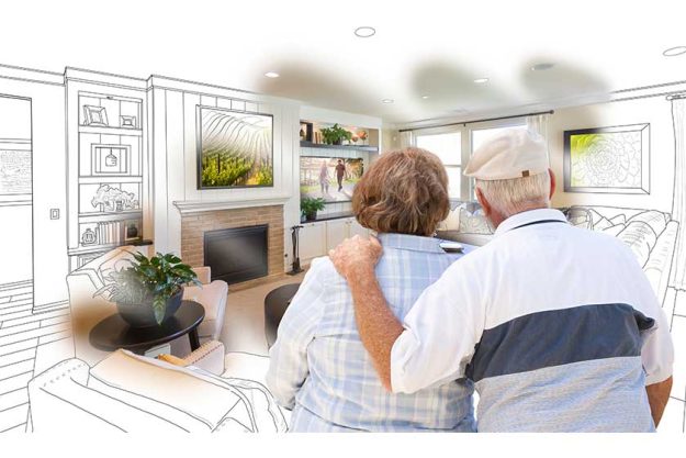 Senior Couple Looking Over Custom Living Room Design Drawing Pho