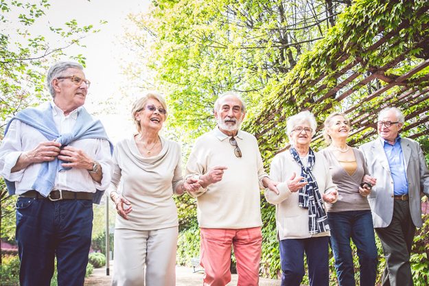 Senior people walking outdoors Senior people walking outdoors
