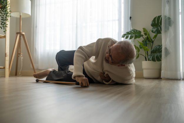Asian senior male falling on the ground while walk with walker a Signs You Should Move To Senior Assisted Living In Elkton, FL