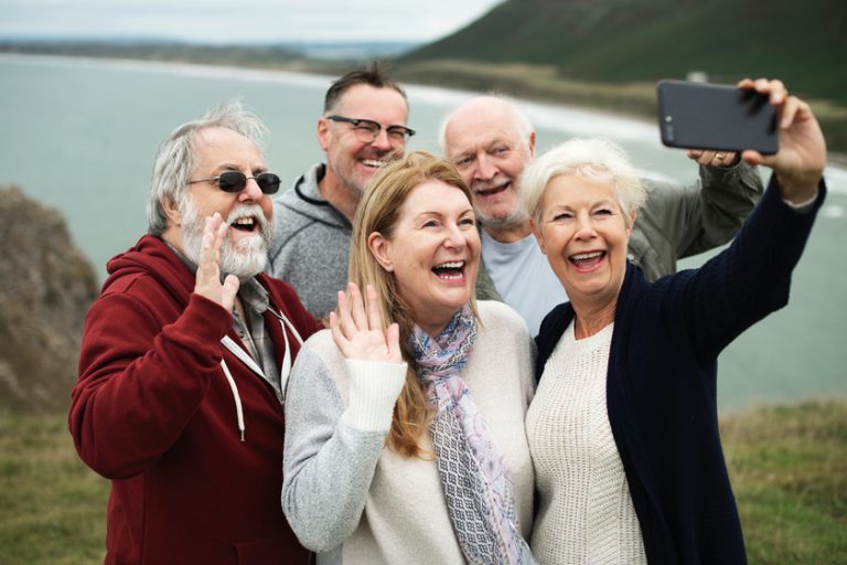 Group of happy seniors taking a selfie Why Living In Saint Johns, FL Is A Great Idea