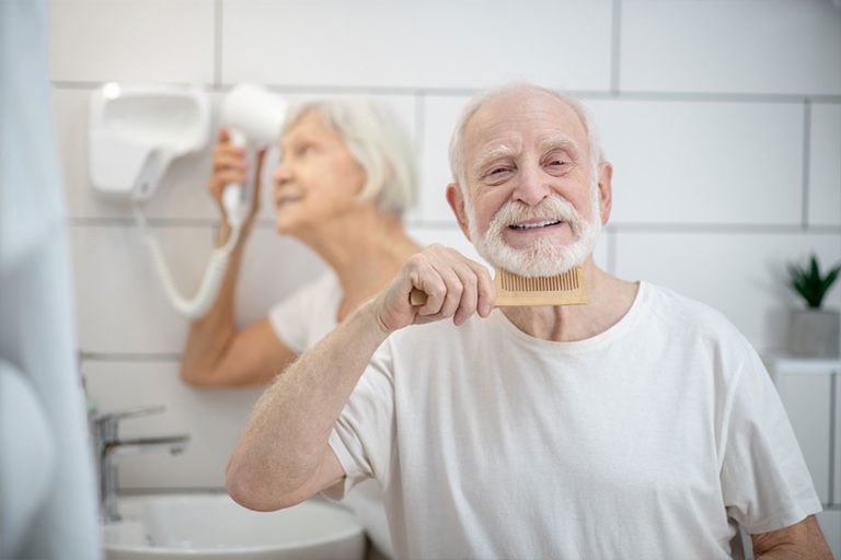 Elderly couple having their morning routine together
