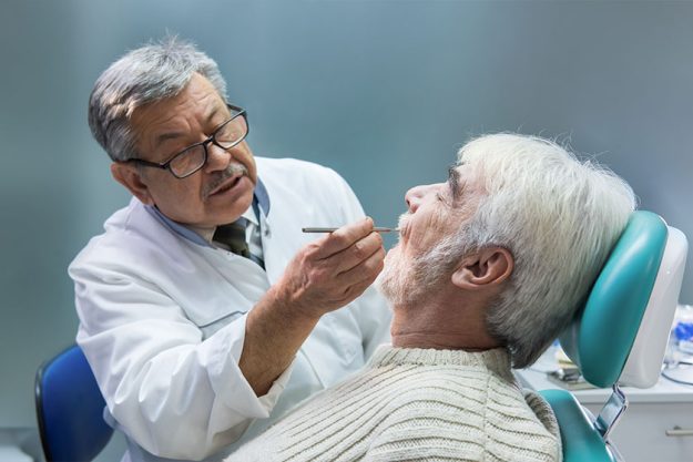Elderly man at the dentist