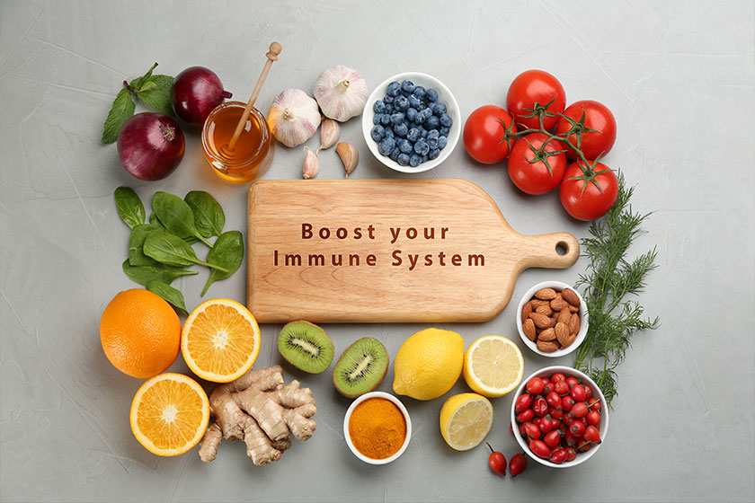 Set of natural products and wooden board with text Boost Your Immune System Set of natural products and wooden board with text Boost Your Immune System