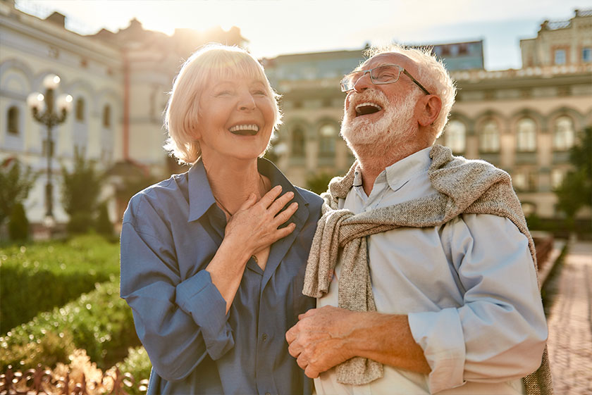 You Make Me Happy! Portrait of beautiful and stylish senior laughing while standing
