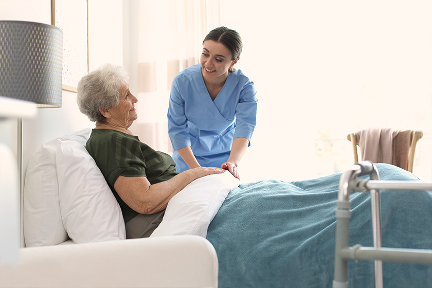 Care worker with elderly woman in geriatric hospice Care worker with elderly woman in geriatric hospice