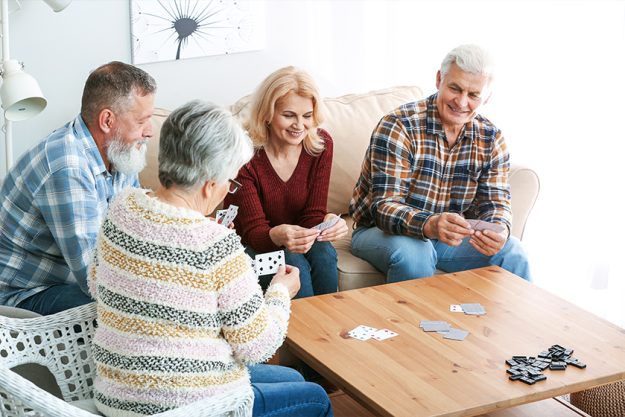 Happy senior people spending time together in nursing home Happy senior people spending time together in nursing home