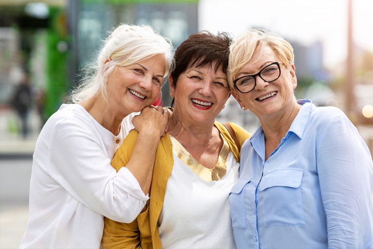 Three senior female friends having good time together Three senior female friends having good time together