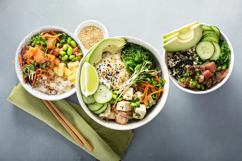 Variety of poke bowls with tuna, salmon and tofu