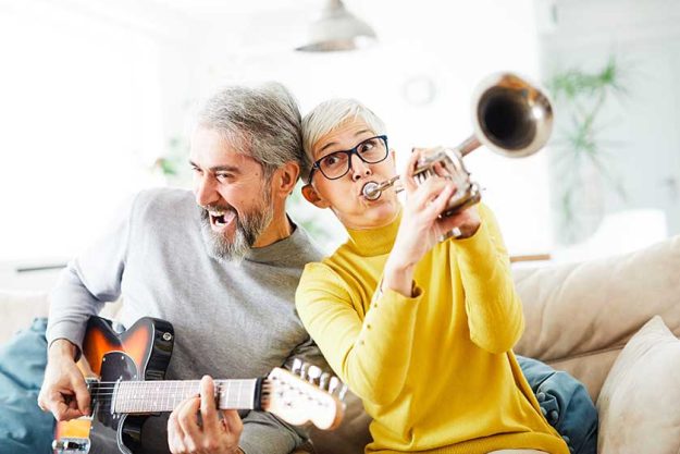 senior couple man woman love retired healthy party playing instrument guitar trumpet fun band iplay senior couple man woman love retired healthy party playing instrument guitar trumpet fun band iplay
