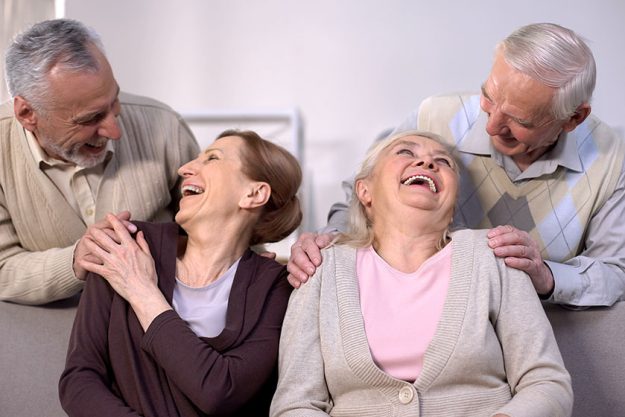 Cheerful old couples laughing and having fun together sitting home, friendship Cheerful old couples laughing and having fun together sitting home, friendship