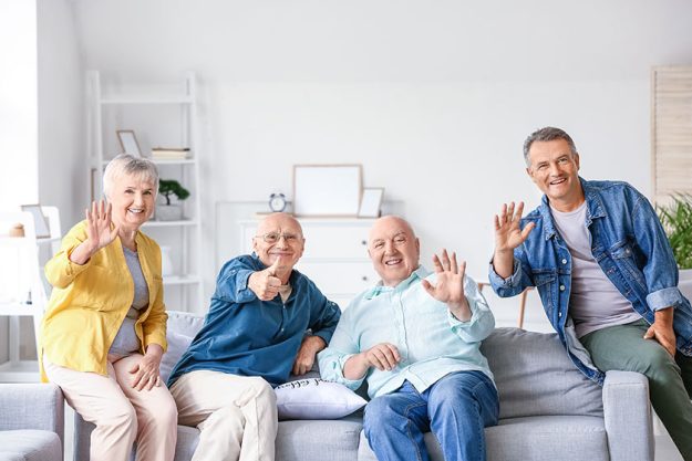 Senior people sitting on sofa at home Senior people sitting on sofa at home