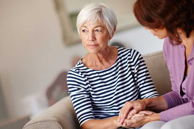 Worried about the future. Shot of a woman sitting beside her elderly mother at home. Worried about the future. Shot of a woman sitting beside her elderly mother at home.