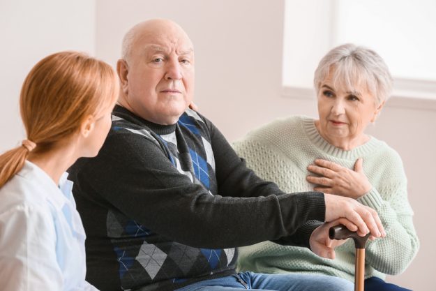 Elderly people suffering from mental disability and doctor at ho Elderly people suffering from mental disability and doctor at ho