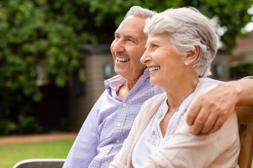 Senior couple sitting on bench Senior couple sitting on bench