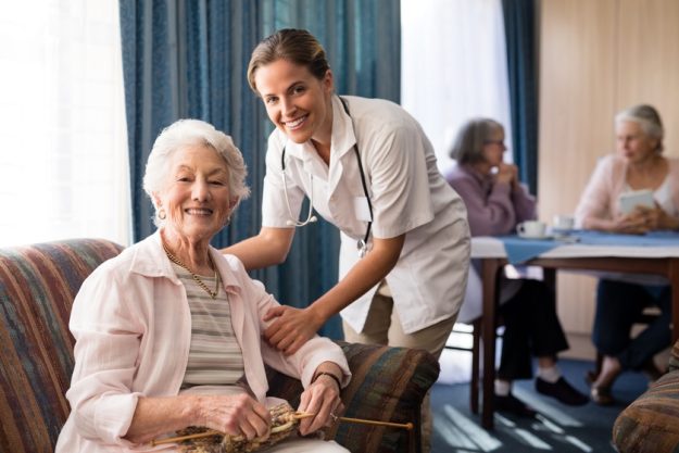 Portrait of smiling female doctor with senior woman Assistance Vs. Medical Services In Marco Island, FL Assisted Living: Six Differences You Need To Know