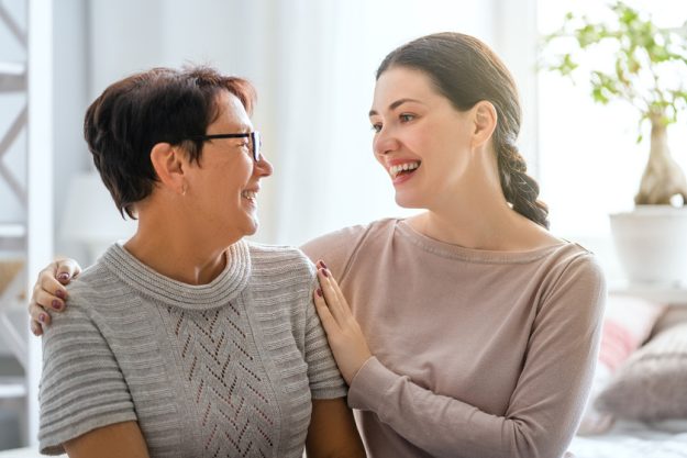 mother and her adult daughter Family Care Home Vs. Assisted Living Community In Dallas, TX: Which Is Better For Your Loved One?