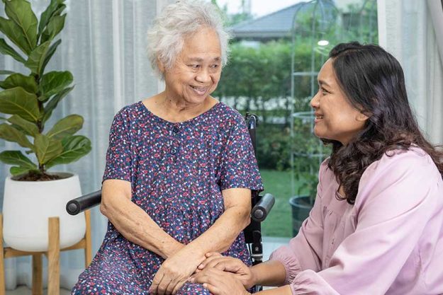 Help and care Asian senior or elderly old lady woman patient sitting on wheelchair