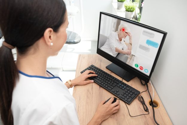 Doctor and senior woman patient, telehealth Is Telehealth Beneficial When Living At Retirement Apartment Communities In Arlington, TX?