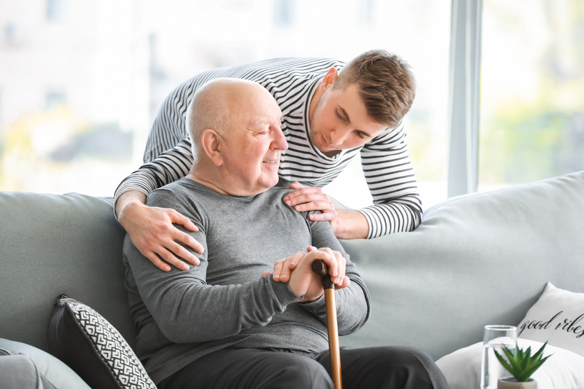 Male caregiver with senior man in nursing home The Importance Of Rent Protection Services In Collier County, FL Senior Community
