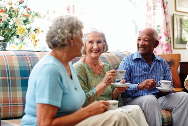 Senior people having coffee