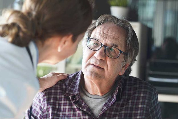 Doctor with patient in medical office Doctor with patient in medical office