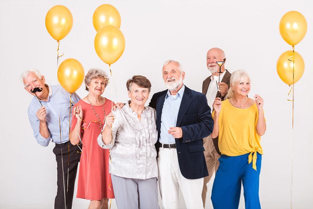 Group of happy senior people celebrating and having fun together Group of happy senior people celebrating and having fun together