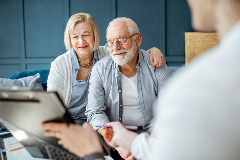 Happy senior couple during the meeting with agent Happy senior couple during the meeting with agent