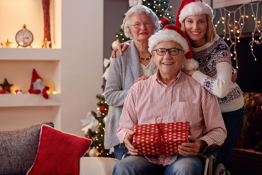 Christmas family portrait of daughter with elderly parents Christmas family portrait of daughter with elderly parents