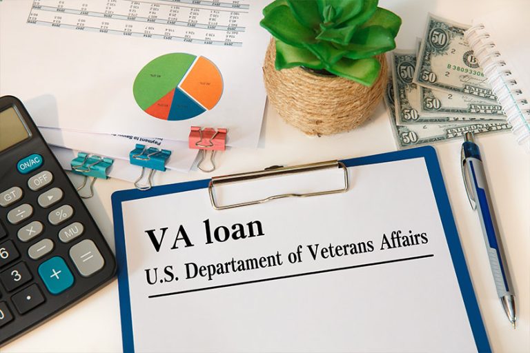 Paper with VA loan - U.S. Departament of Veterans Affairs on the table
