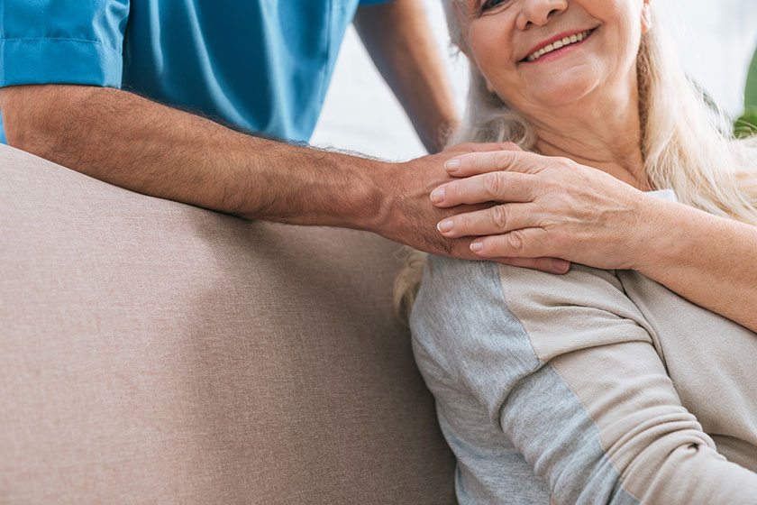 Smiling Senior Woman Holding Hand Caregiver Smiling Senior Woman Holding Hand Caregiver