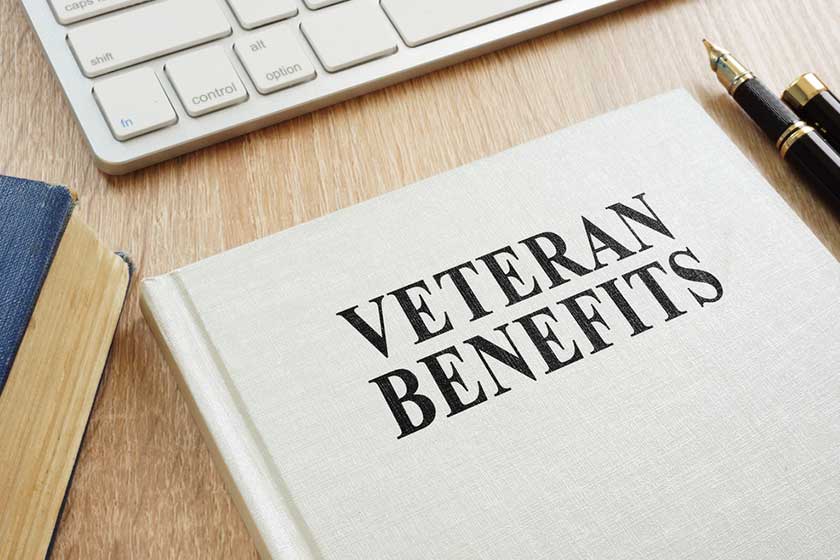 Book about Veteran Benefits on a desk Book about Veteran Benefits on a desk