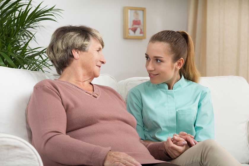 Care assistant with a patient