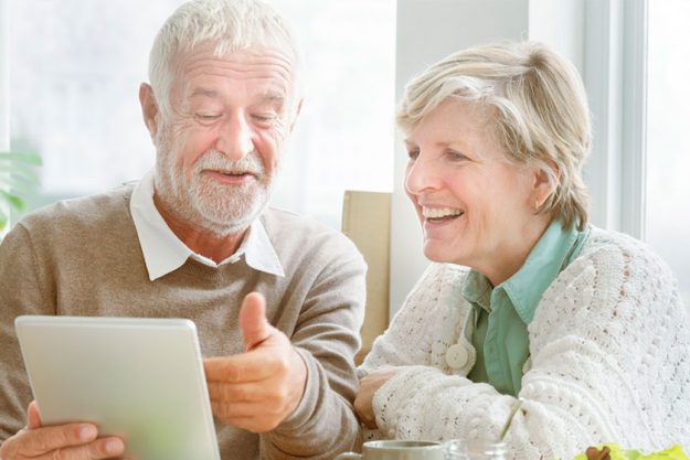 Elderly people using tablet