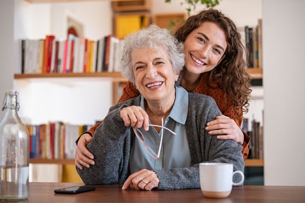Grandma and granddaughter laughing