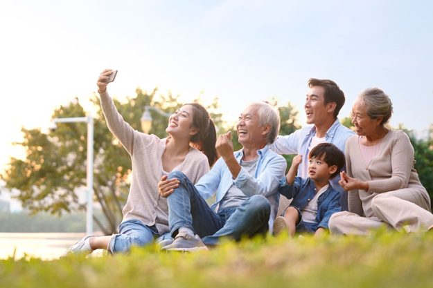 happiness asian family candid of taking selfie happiness asian family candid of taking selfie