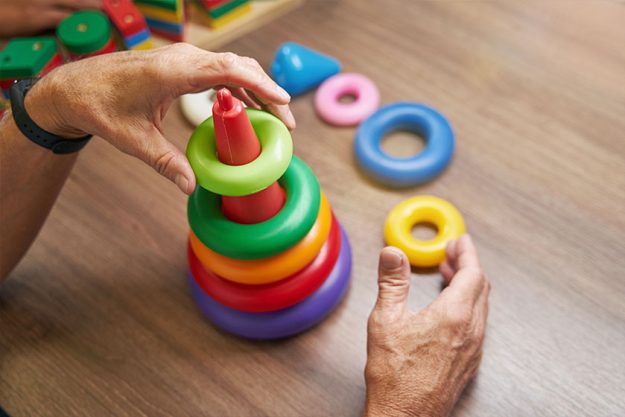 Mature man recovering motor skills Mature man recovering motor skills