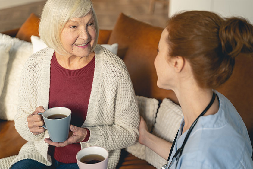 Positive delighted senior female being in all ears Positive delighted senior female being in all ears