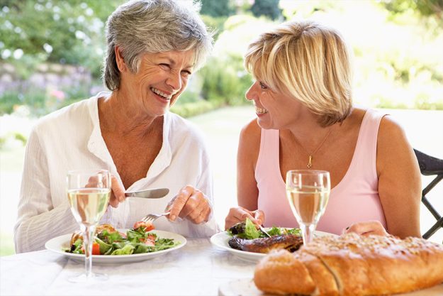 Friends Eating An Al Fresco Meal Friends Eating An Al Fresco Meal