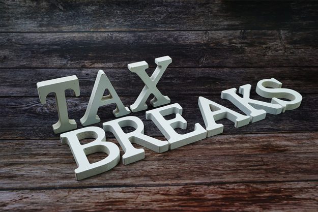 Tax Breaks Word alphabet letters on wooden bac