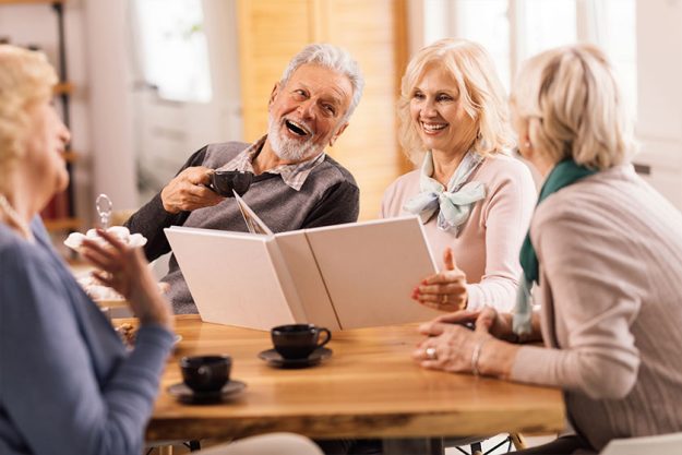 Group Mature Friends Talking Having Fun While Remembering Old Times