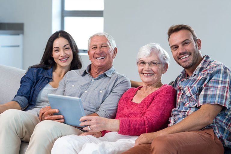 Happy family sitting on sofa Happy family sitting on sofa