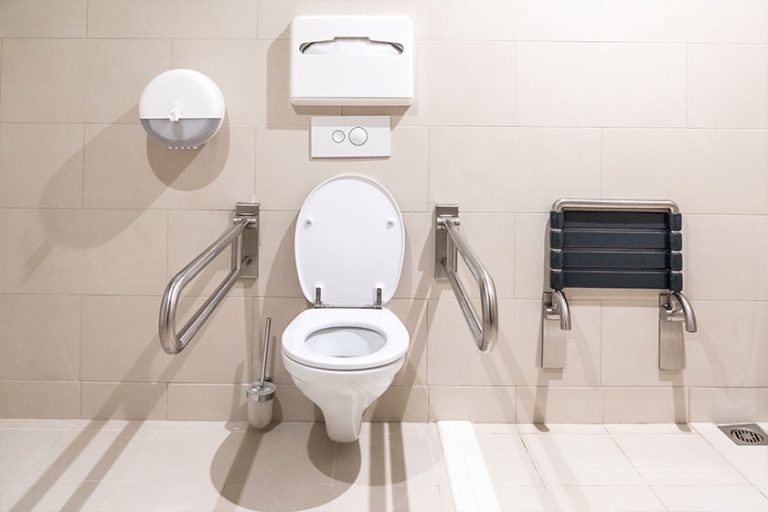 Public restroom for disabled people with special equipment Public restroom for disabled people with special equipment