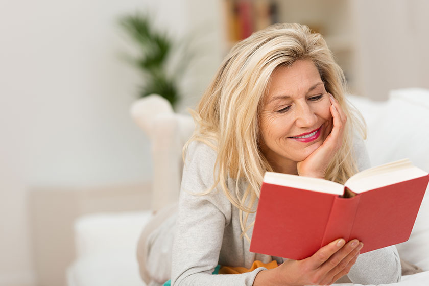 Smiling Woman Reading Book Smiling Woman Reading Book