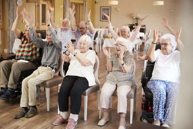 Group Of Seniors Enjoying Fitness Class In Retirement Home How Long Does It Take For Seniors To Adapt To Assisted Living Homes In Gifford, FL?