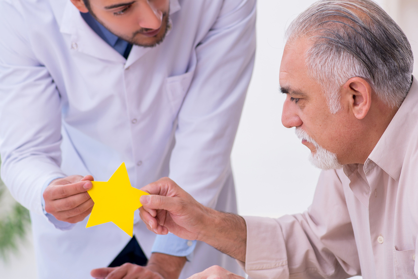 Doctor and patient suffering from Alzheimer disease How Speech Therapy In A Memory Care Unit In Tampa, FL Can Benefit Those With Alzheimer's