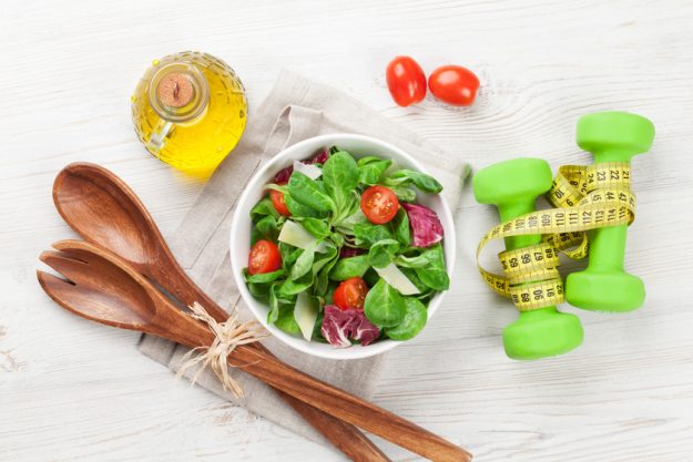 Healthy salad and fitness equipment Healthy salad