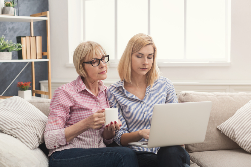 Adult mother and daughter using laptop at home. The Reasons Why Your Aging Parents Should Be Involved In Choosing An Assisted Living Home In Quantico, VA